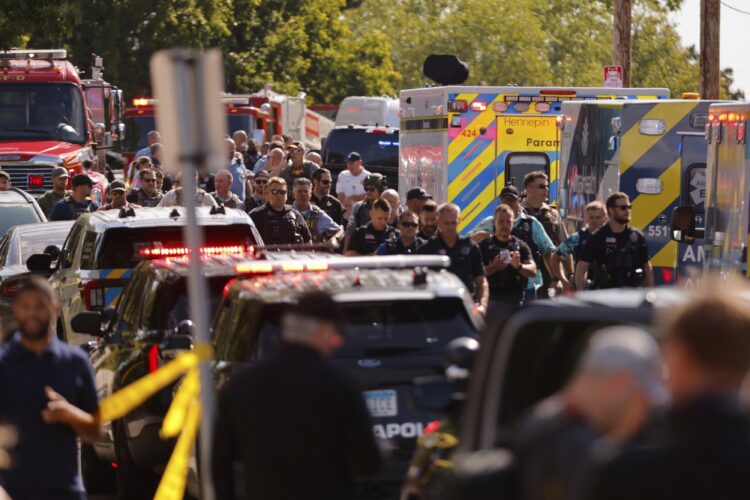 Minneapolis police: shooting at Catholic school has left two dead, including shooter, and 17 injured